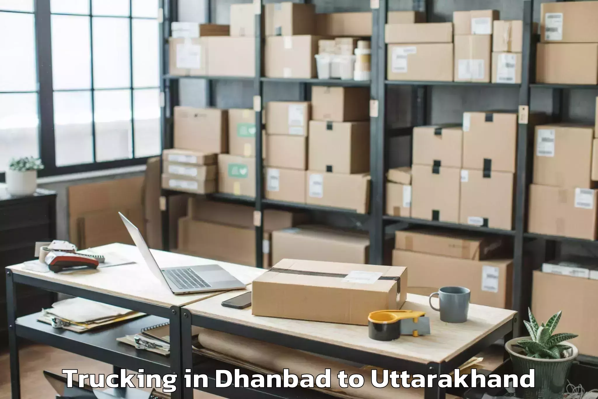 Easy Dhanbad to Herbertpur Trucking Booking